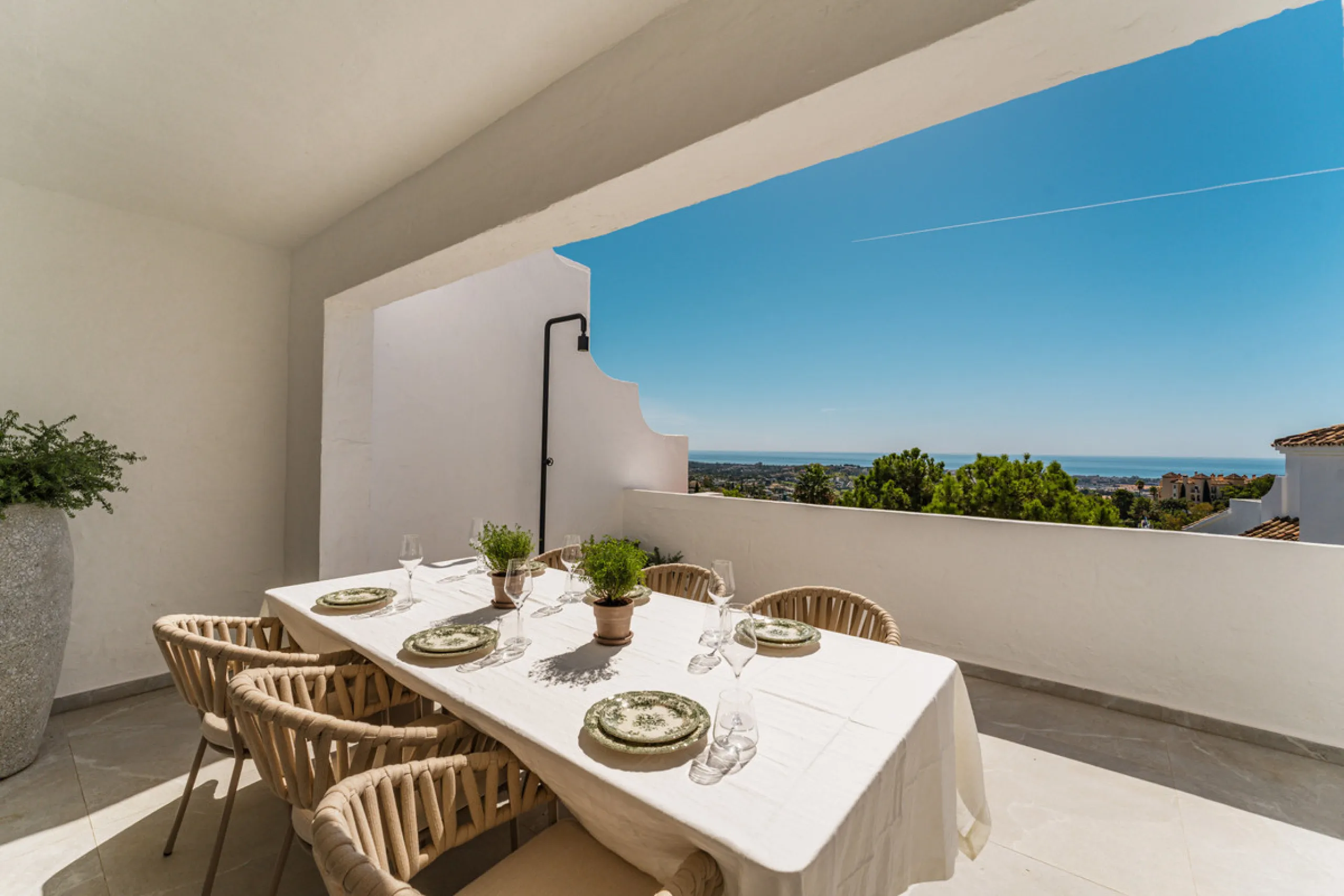 Contemporary duplex for sale in the exclusive Las Colinas de Marbella community in Benahavís, offering three bedrooms and three bathroom.  Designed with both style and function in mind, this home brings together modern living spaces with panoramic sea and