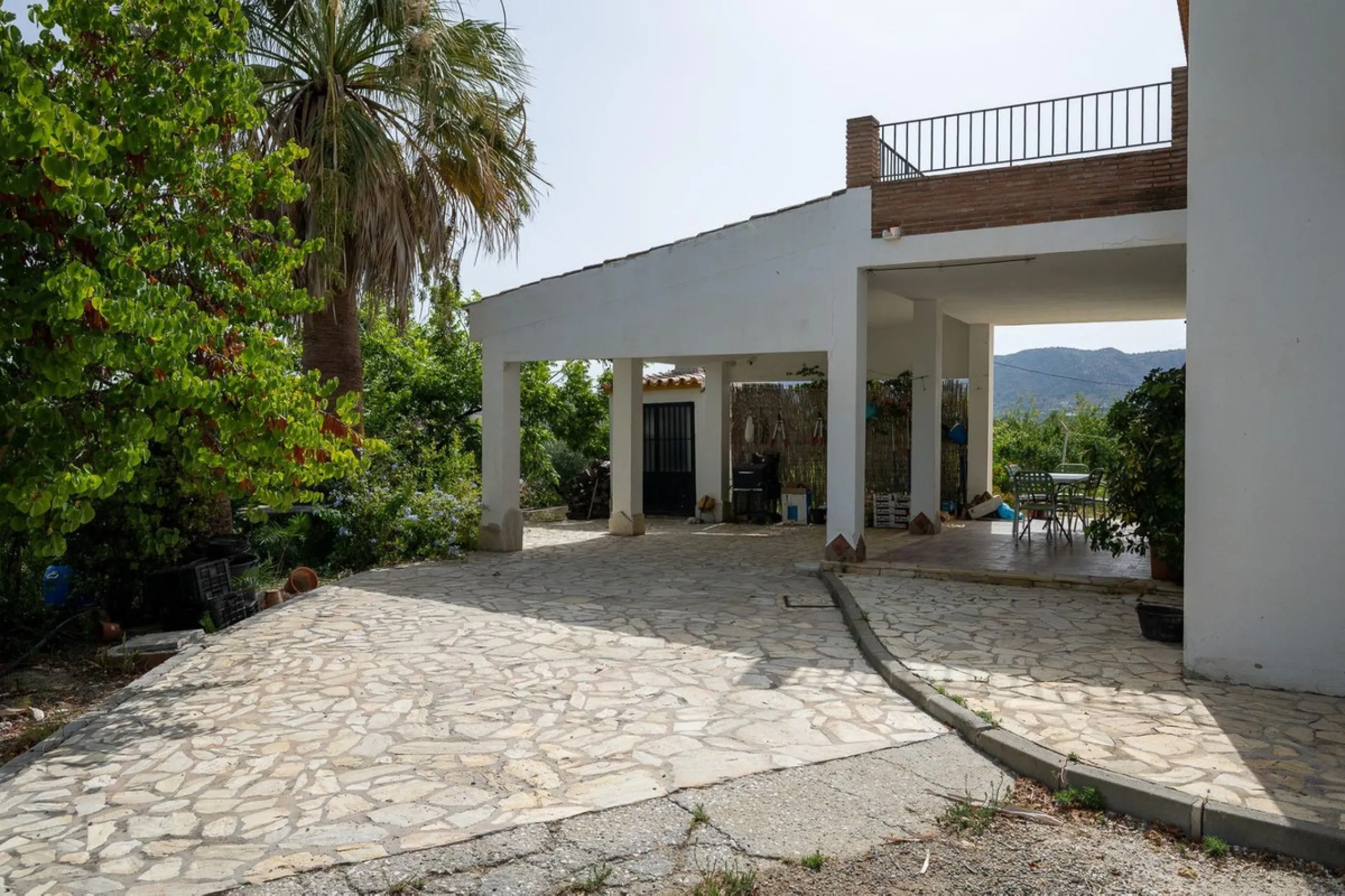 Wonderful finca with almost 50,000 m2 of land, totally fenced, with 5 different entrances, water from its own well plus irrigation water from the canal such us two algibes/ water deposits. T he land is divided into several terraces and planted mainly with