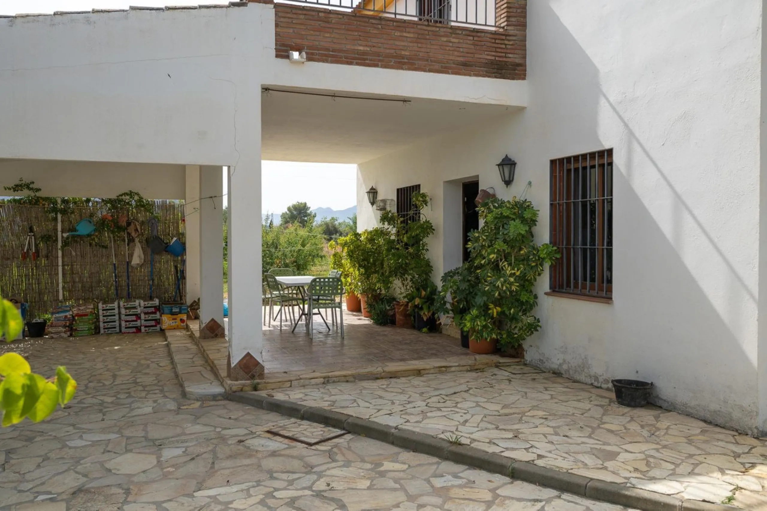 Wonderful finca with almost 50,000 m2 of land, totally fenced, with 5 different entrances, water from its own well plus irrigation water from the canal such us two algibes/ water deposits. T he land is divided into several terraces and planted mainly with