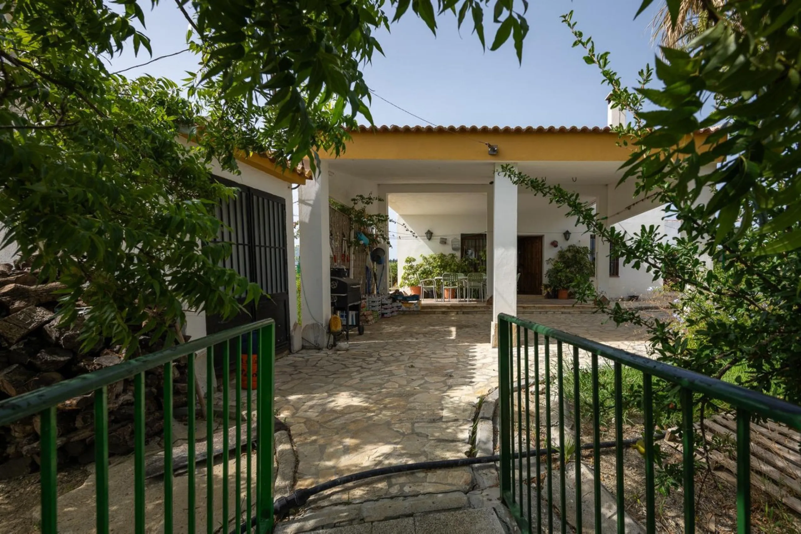 Wonderful finca with almost 50,000 m2 of land, totally fenced, with 5 different entrances, water from its own well plus irrigation water from the canal such us two algibes/ water deposits. T he land is divided into several terraces and planted mainly with