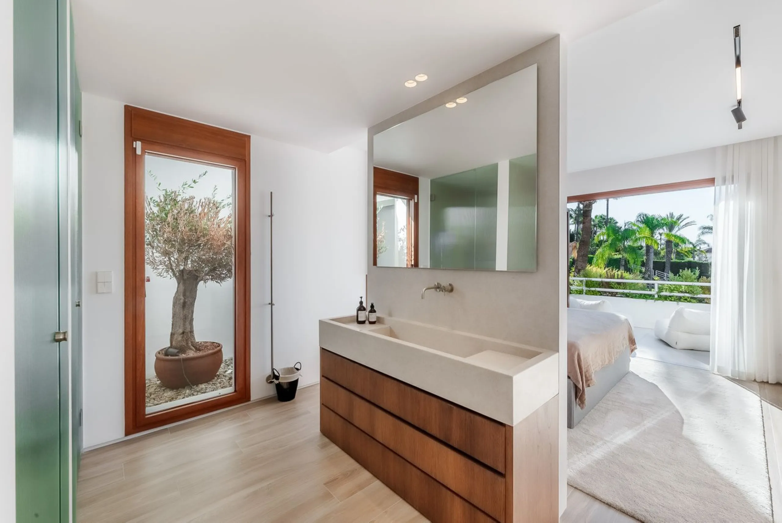 Welcome to this newly renovated duplex ground floor apartment in the heart of Nueva Andalucia, Marbella.