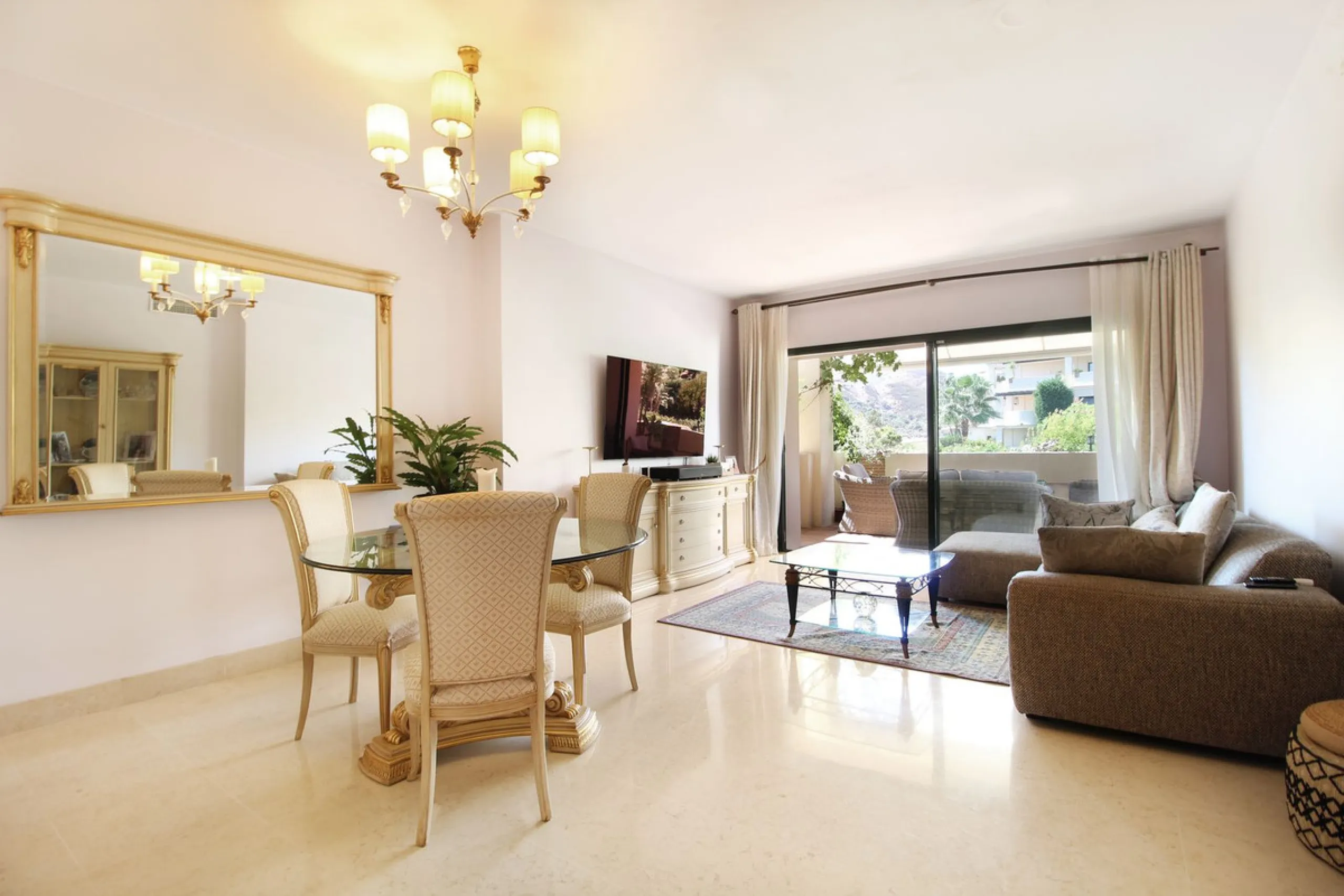 Luxurious Ground-Floor Apartment in Capanes del Golf – Resort Living within El Higueral Golf course close to Marbella, Benahavis & Estepona