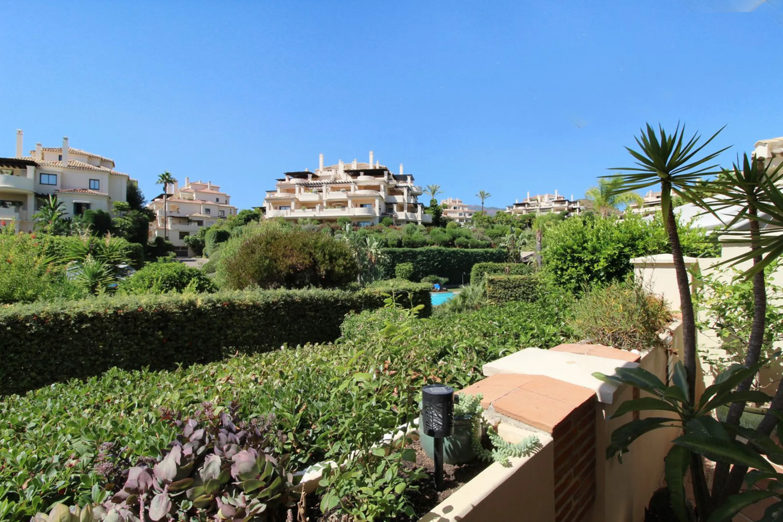 Luxurious Ground-Floor Apartment in Capanes del Golf – Resort Living within El Higueral Golf course close to Marbella, Benahavis & Estepona