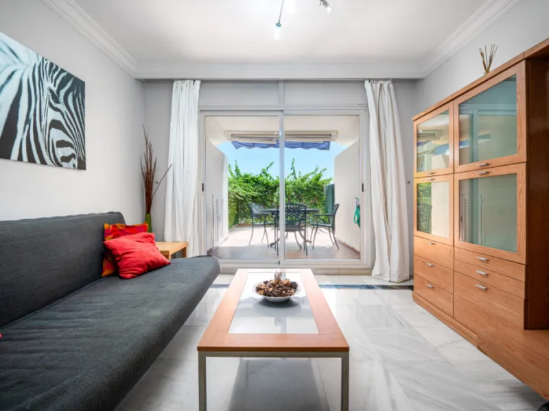 Located in the heart of Marbella's Golden Mile, Apartment Costa is a modern ground floor home just five minutes from the beach. This elegant property offers one spacious bedroom, a bright open-plan living and dining area, and a large private terrace with 