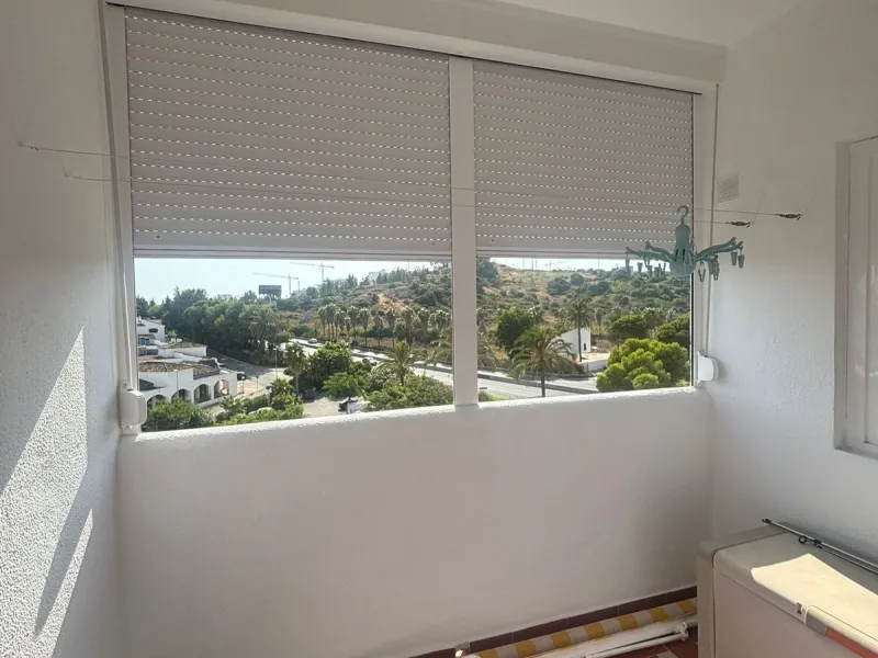 Prime Frontline Beach Apartment on Estepona's Serene Playa de Guadalobón