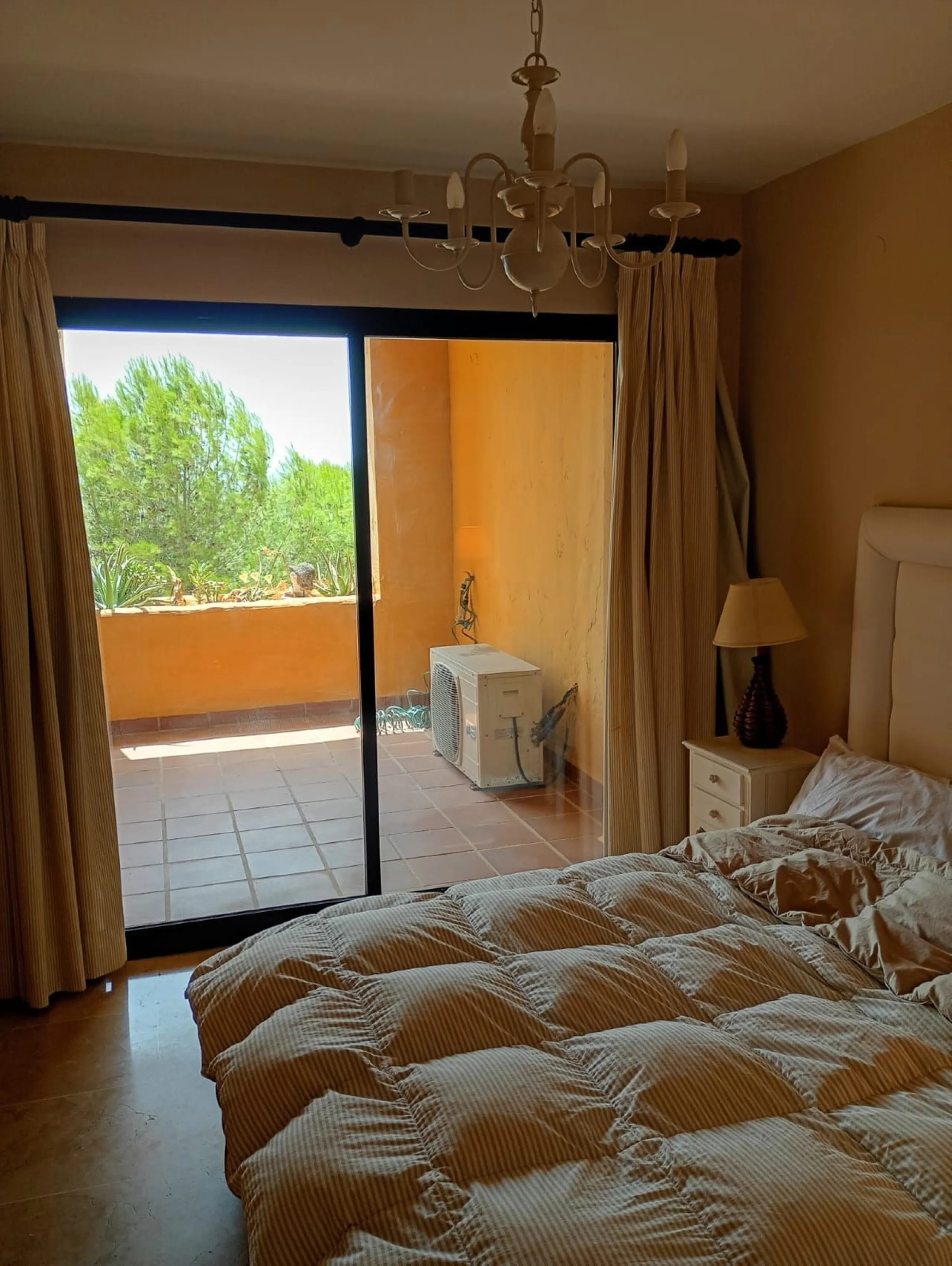 A lovely elevated ground floor apartment in the exclusive area of Selwo, Estepona.