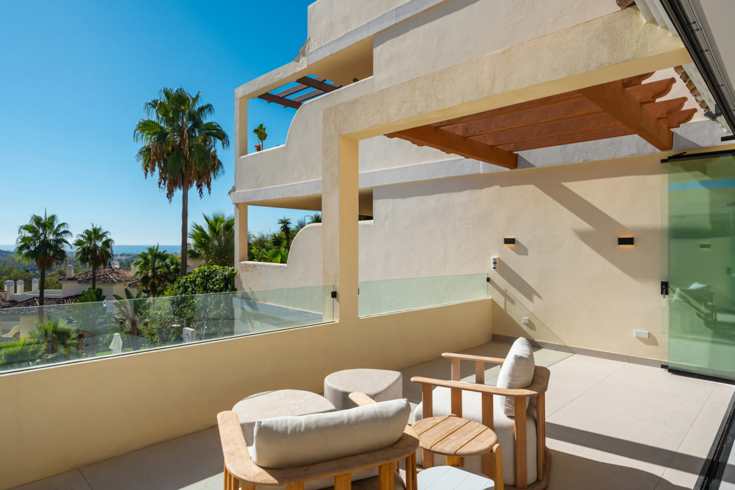Apartment Jasmine is a beautifully renovated three-bedroom apartment for sale in the exclusive Palacetes Los Belvederes, an established residential community in Nueva Andalucía. Originally built in 2003 and fully modernised in 2024, this southeast-facing 