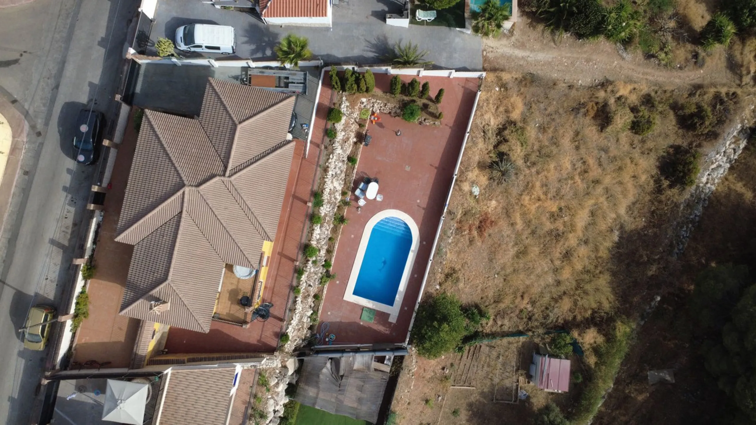 With incredible views down the valley to the coast of Málaga and the sea, this impressive, detached villa can be used as either a spacious family home or has the possibility of being a high-end B&B business.
