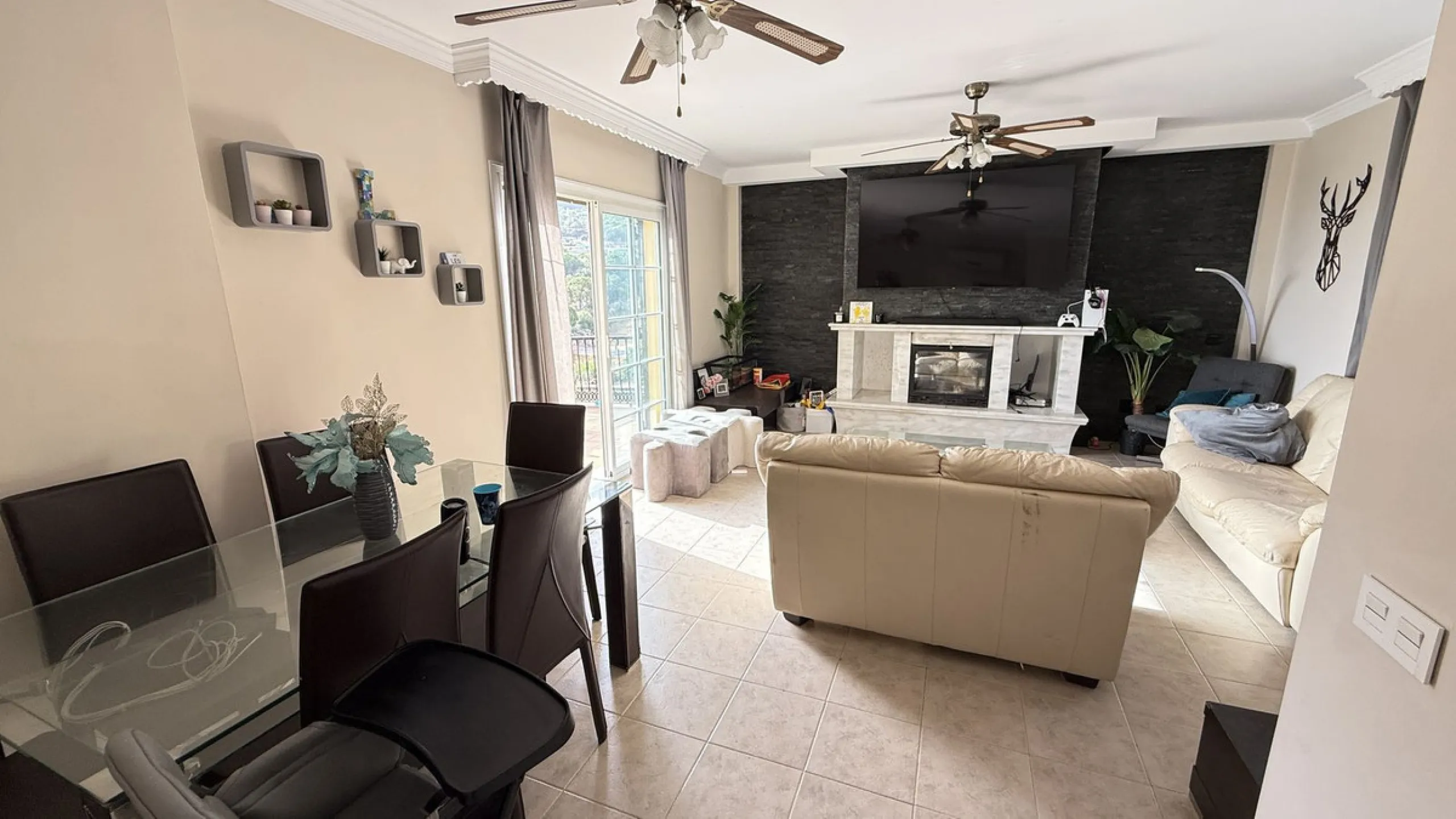 With incredible views down the valley to the coast of Málaga and the sea, this impressive, detached villa can be used as either a spacious family home or has the possibility of being a high-end B&B business.