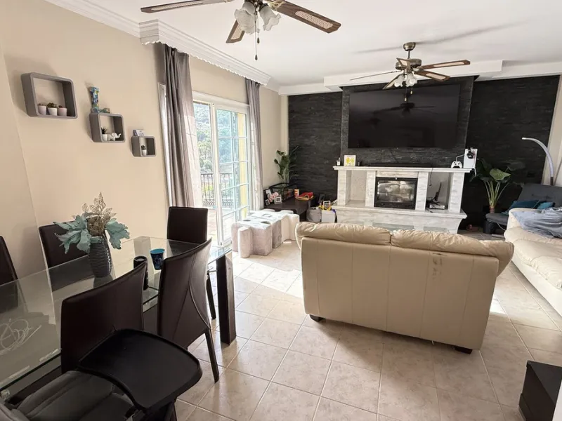 With incredible views down the valley to the coast of Málaga and the sea, this impressive, detached villa can be used as either a spacious family home or has the possibility of being a high-end B&B business.