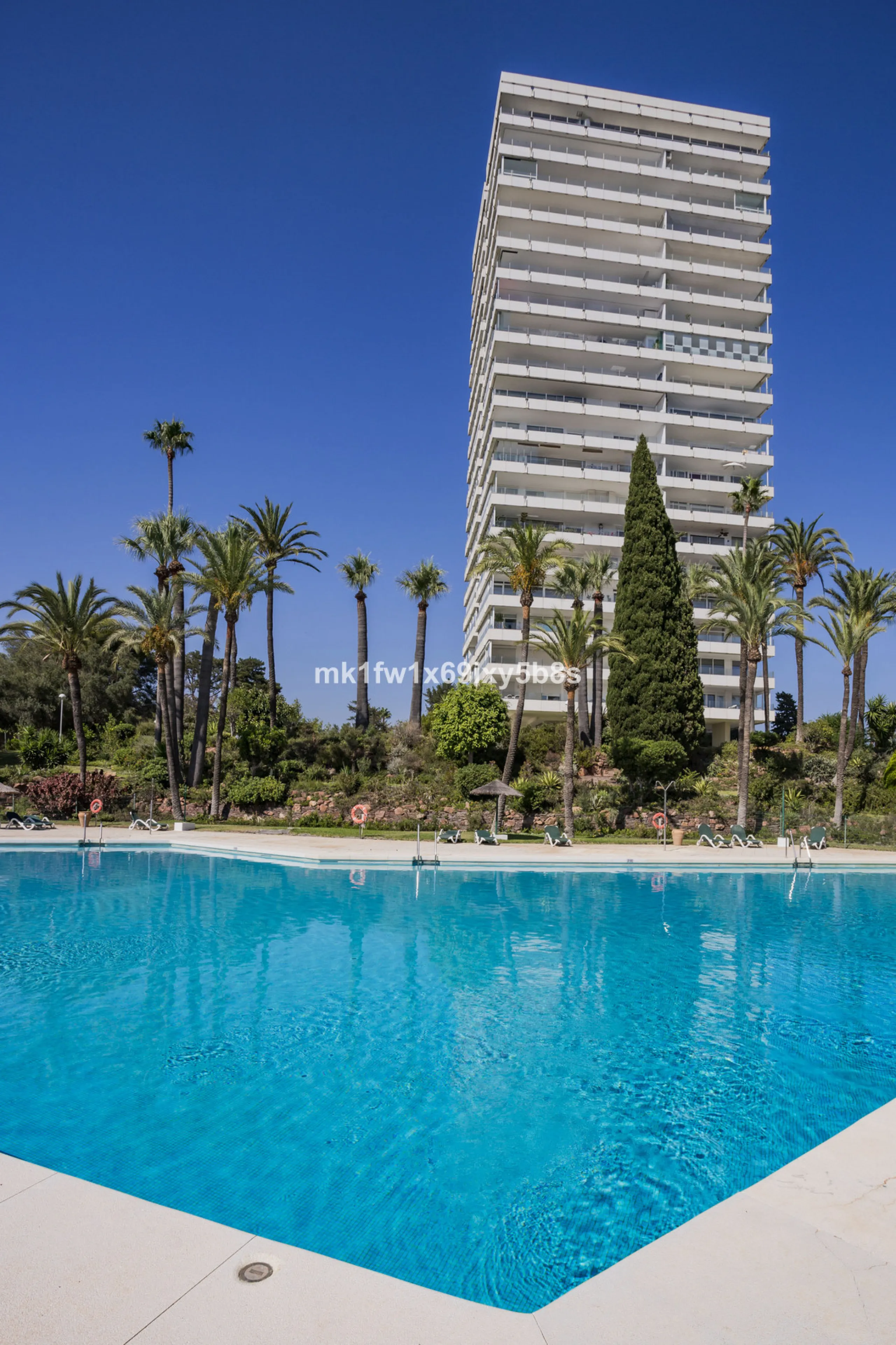 This beautifully renovated two-bedroom apartment is situated in the iconic Torre de Río Real, one of Marbella's most renowned buildings. Located in the exclusive Río Real residential area in Eastern Marbella, it's just a 5-minute drive from Marbella's cit