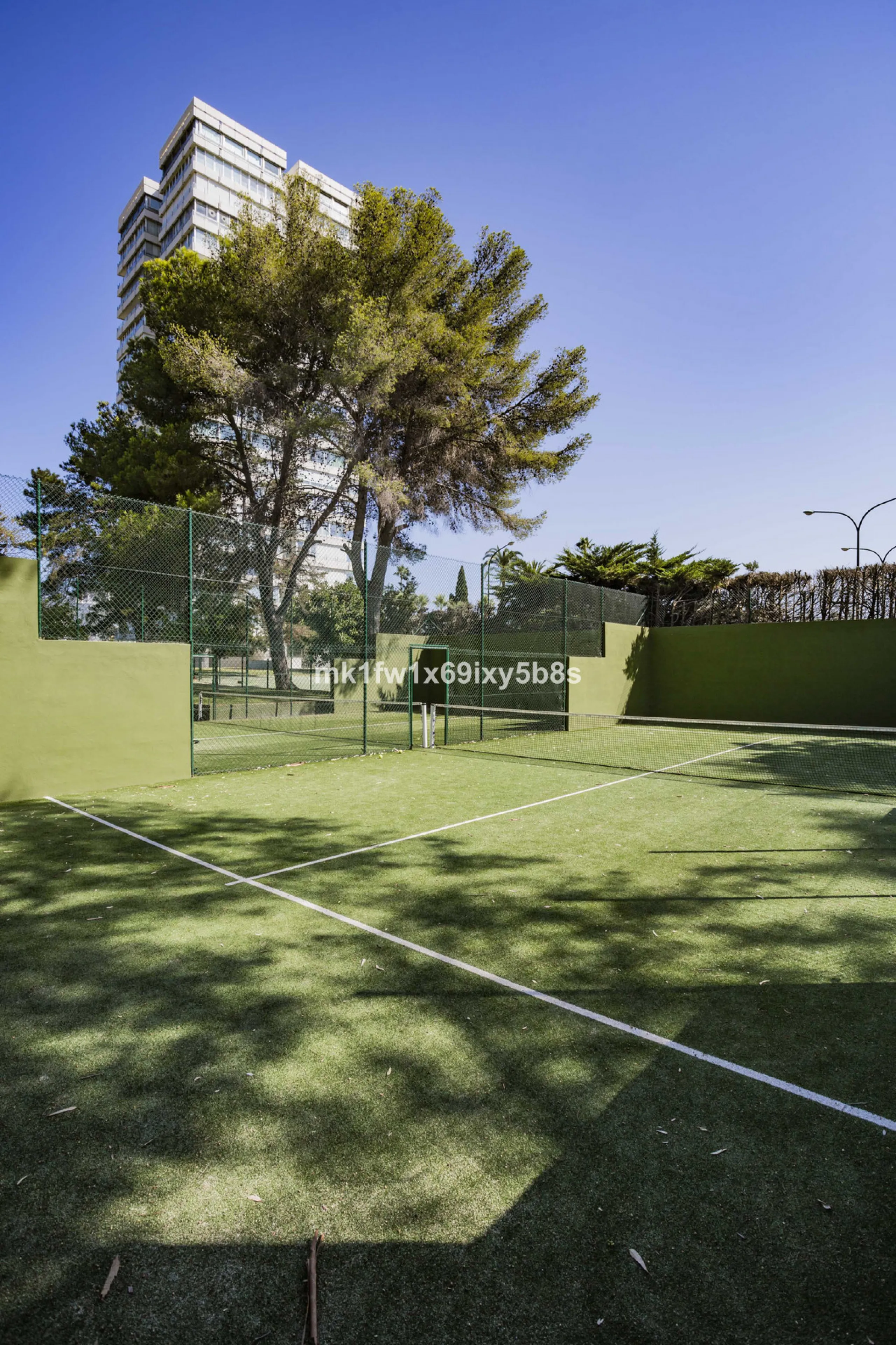 This beautifully renovated two-bedroom apartment is situated in the iconic Torre de Río Real, one of Marbella's most renowned buildings. Located in the exclusive Río Real residential area in Eastern Marbella, it's just a 5-minute drive from Marbella's cit