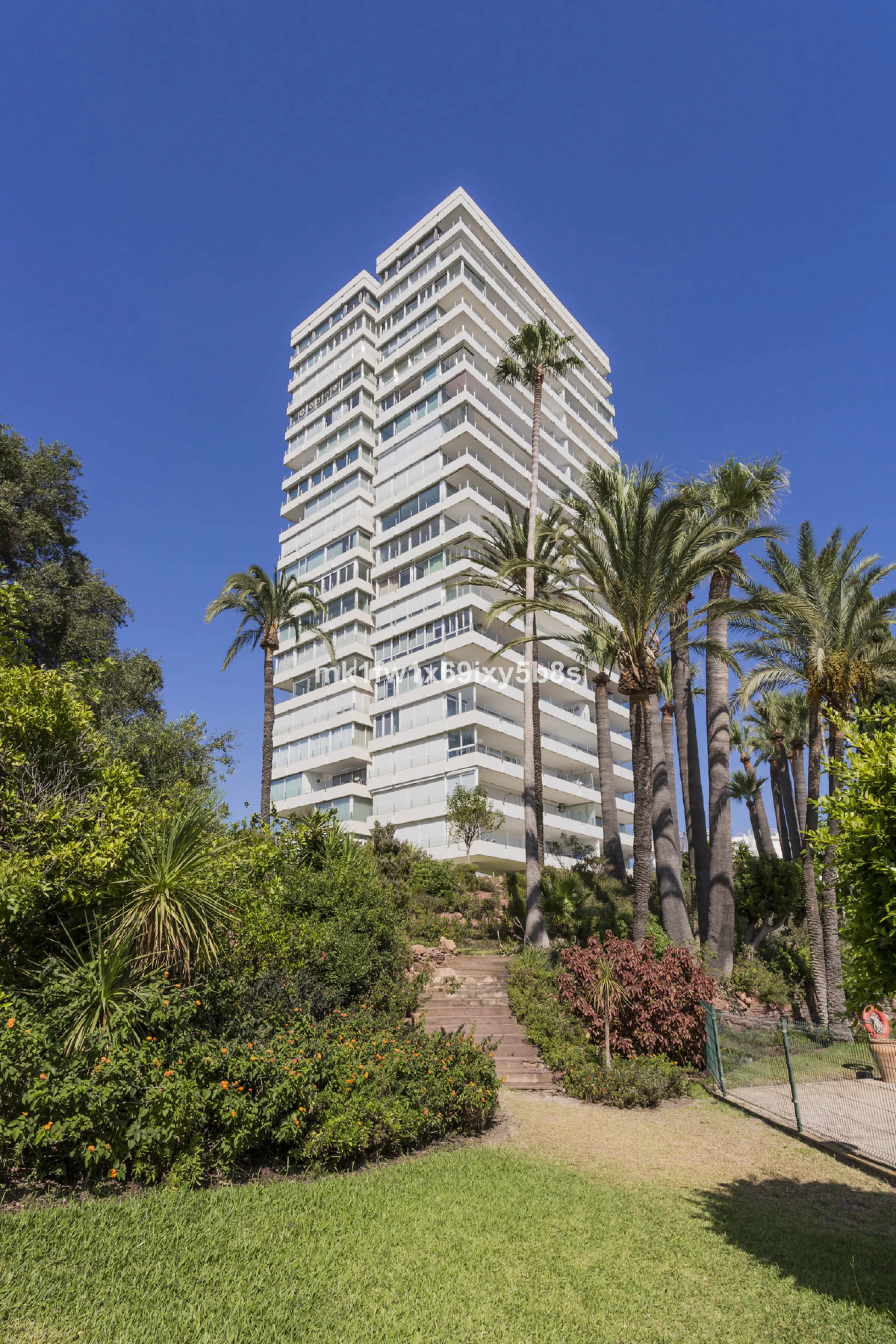 This beautifully renovated two-bedroom apartment is situated in the iconic Torre de Río Real, one of Marbella's most renowned buildings. Located in the exclusive Río Real residential area in Eastern Marbella, it's just a 5-minute drive from Marbella's cit