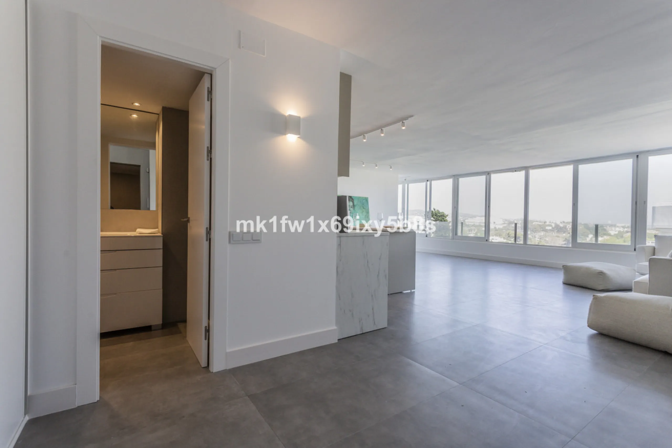 This beautifully renovated two-bedroom apartment is situated in the iconic Torre de Río Real, one of Marbella's most renowned buildings. Located in the exclusive Río Real residential area in Eastern Marbella, it's just a 5-minute drive from Marbella's cit