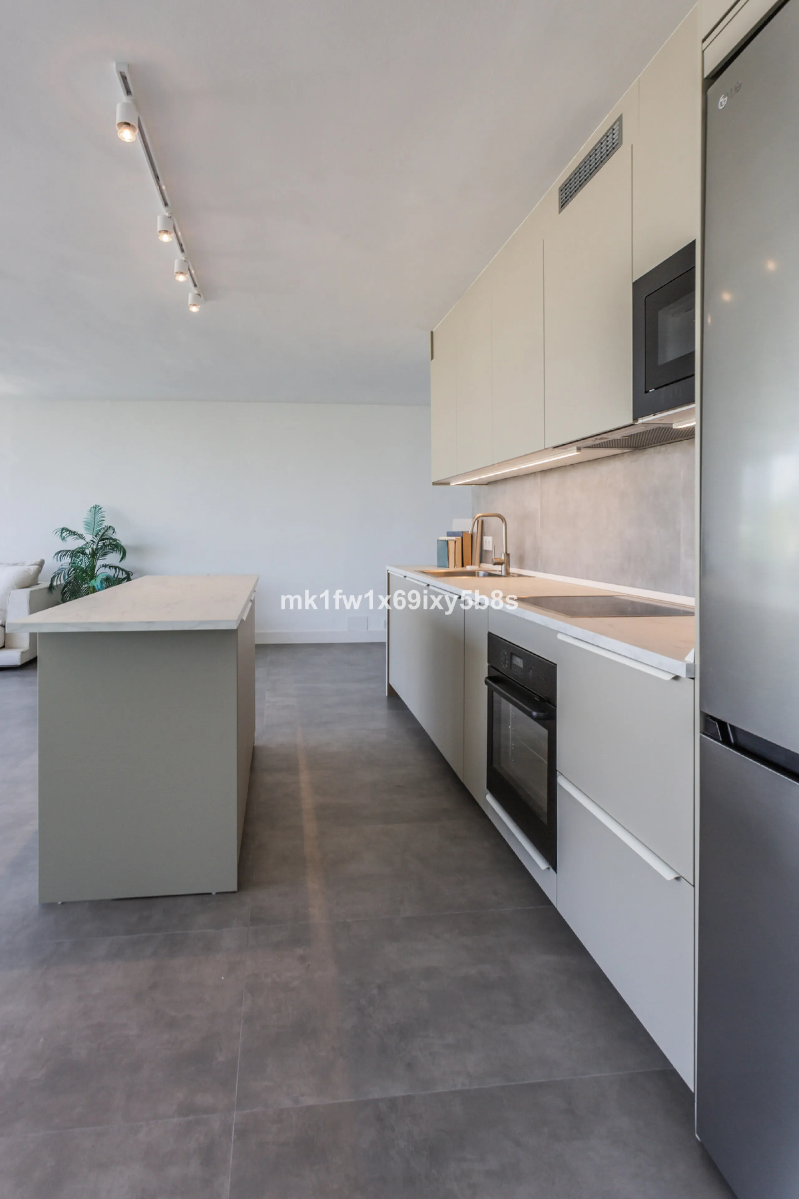 This beautifully renovated two-bedroom apartment is situated in the iconic Torre de Río Real, one of Marbella's most renowned buildings. Located in the exclusive Río Real residential area in Eastern Marbella, it's just a 5-minute drive from Marbella's cit