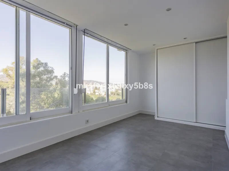This beautifully renovated two-bedroom apartment is situated in the iconic Torre de Río Real, one of Marbella's most renowned buildings. Located in the exclusive Río Real residential area in Eastern Marbella, it's just a 5-minute drive from Marbella's cit