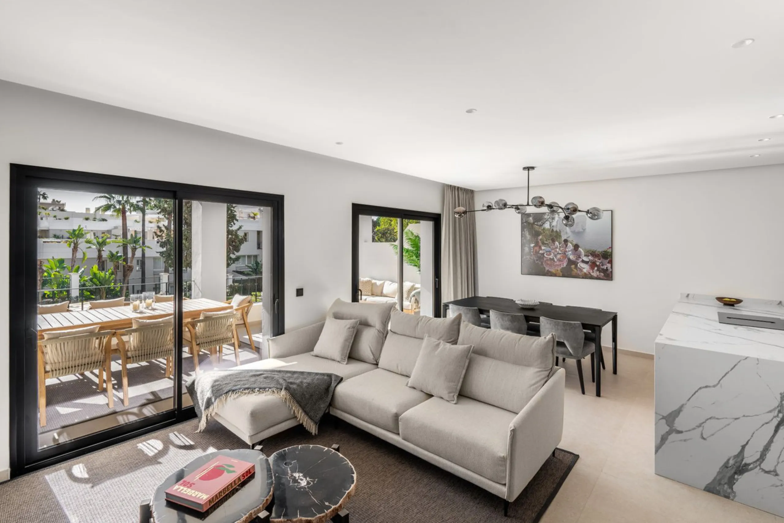 This is a refined duplex penthouse set within the gated community of Aloha Gardens in Nueva Andalucía. This property presents a well-balanced combination of modern design and a prime location in one of Marbella's most established areas. The main floor is 