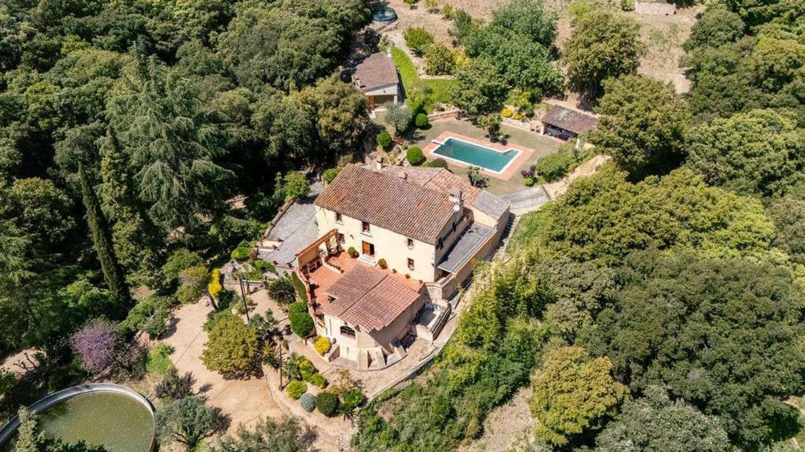 Rehabilitated Catalan Masia with Privacy and Multiple Buildings in the Province of Barcelona