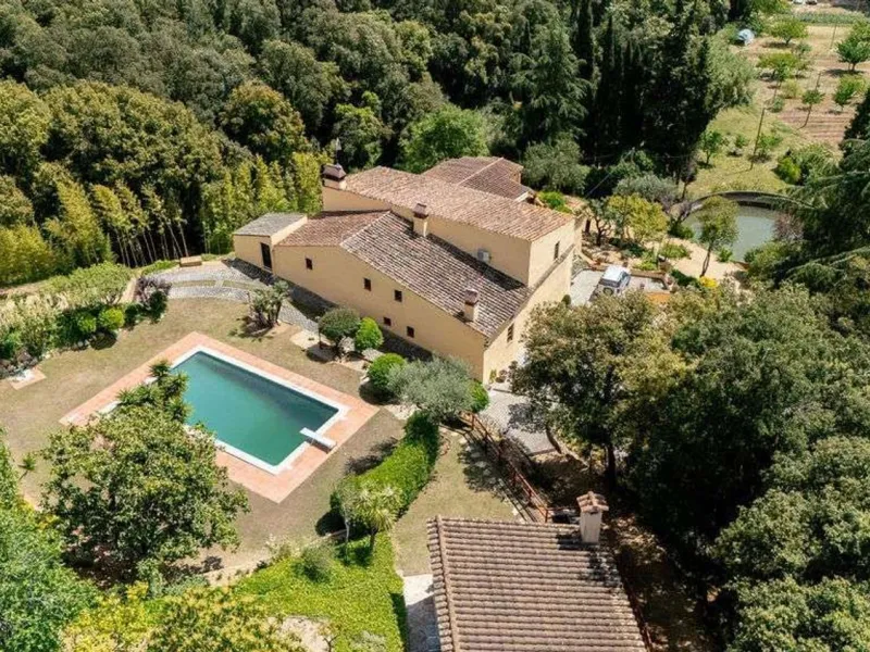 Rehabilitated Catalan Masia with Privacy and Multiple Buildings in the Province of Barcelona