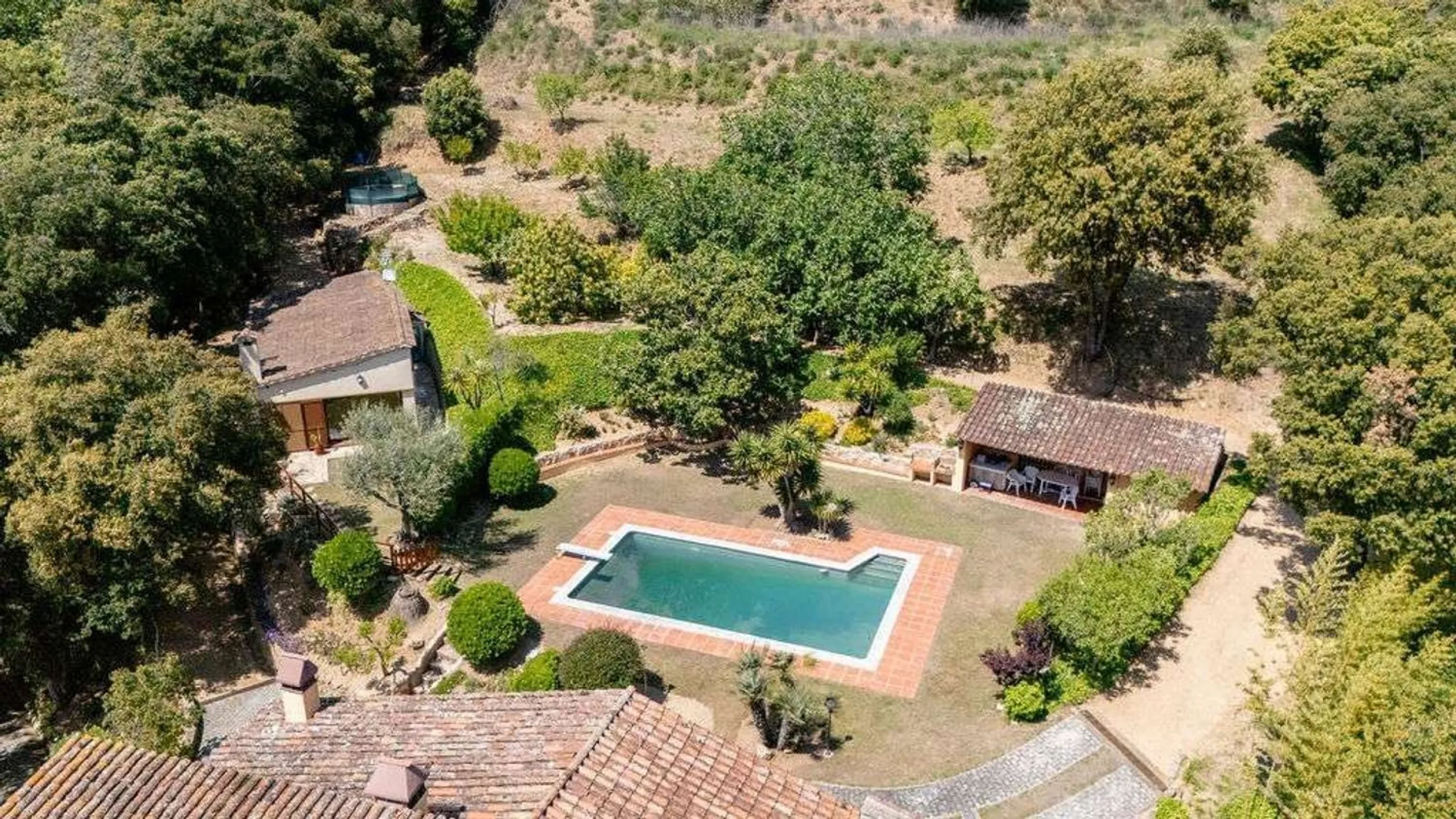 Rehabilitated Catalan Masia with Privacy and Multiple Buildings in the Province of Barcelona