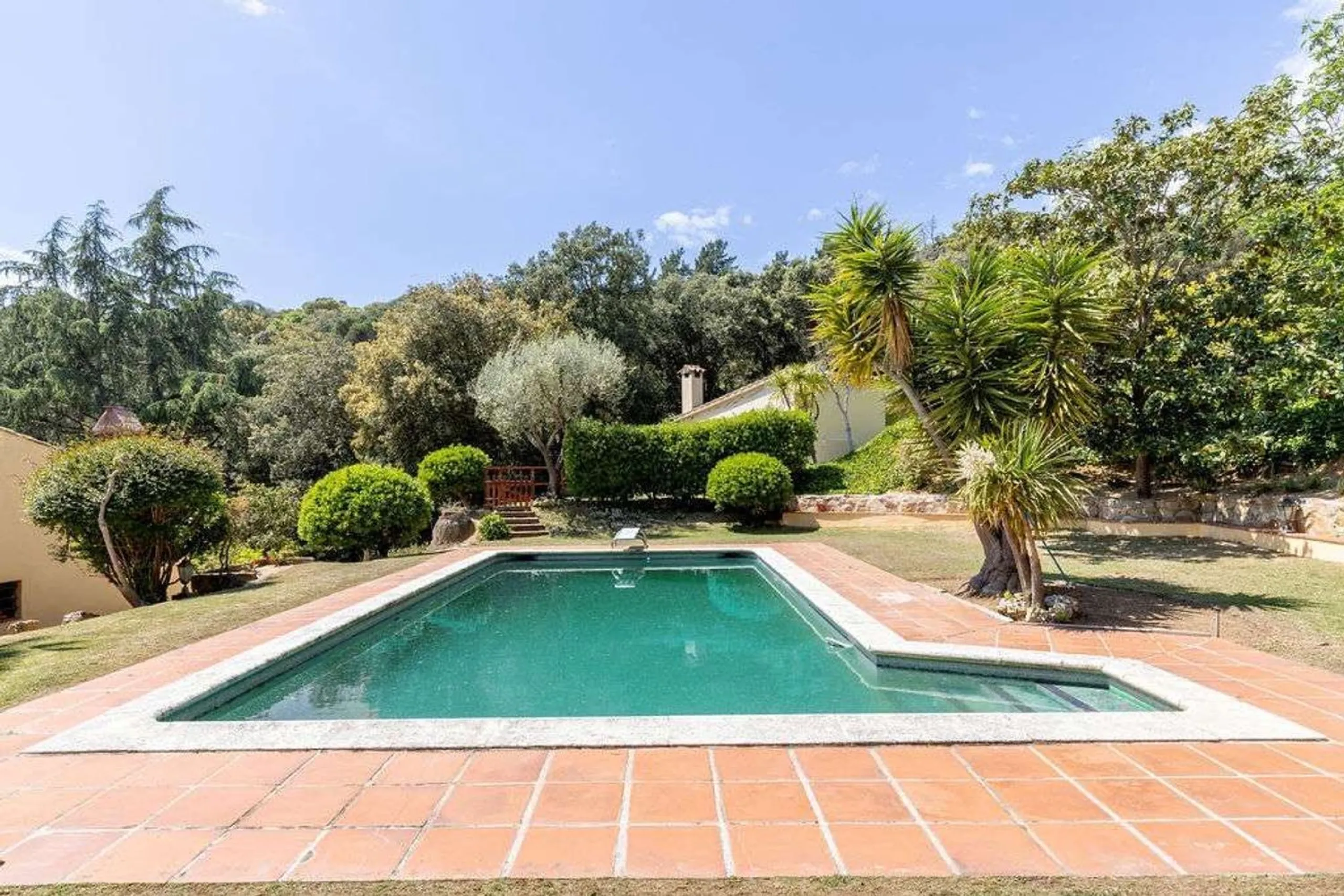 Rehabilitated Catalan Masia with Privacy and Multiple Buildings in the Province of Barcelona