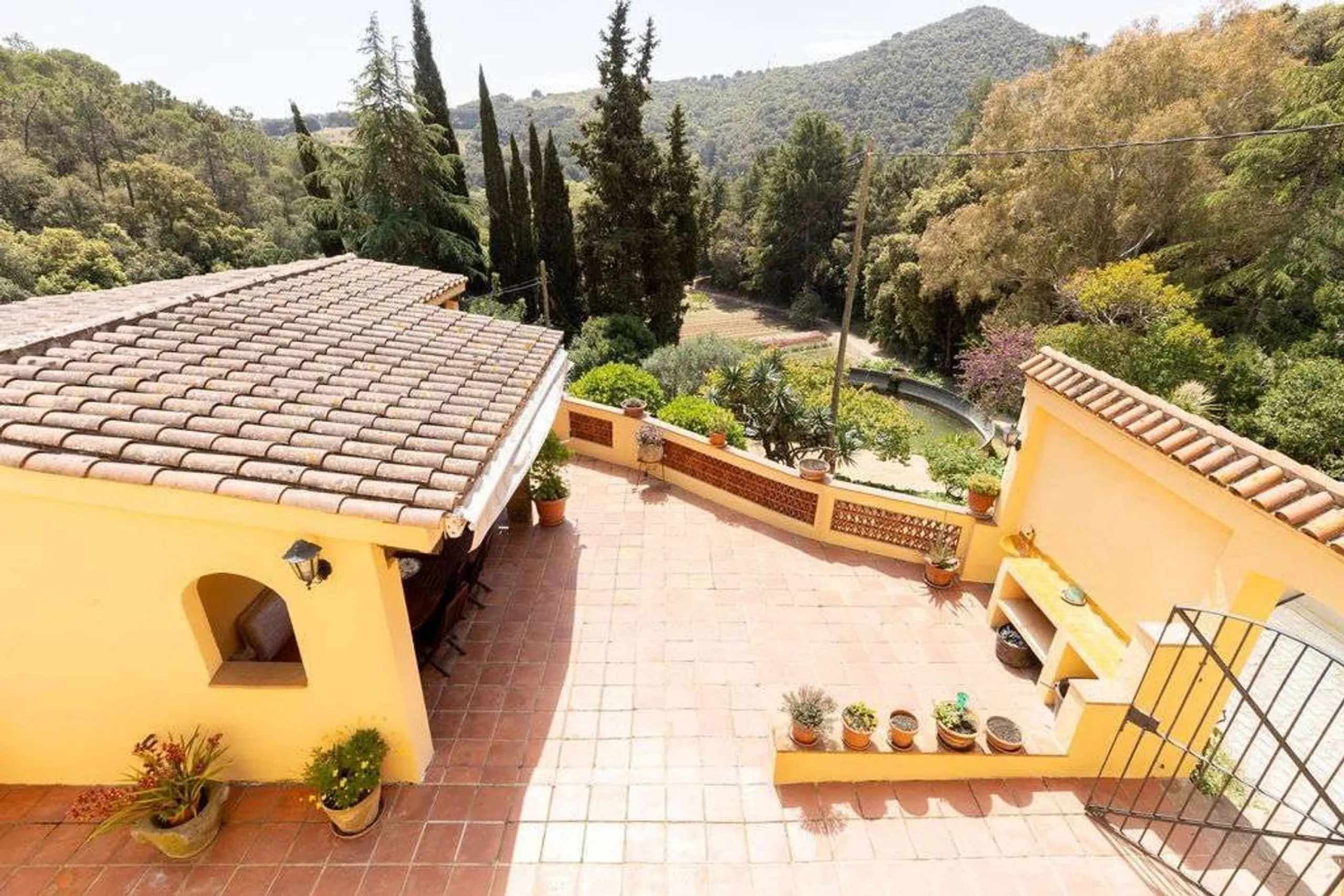 Rehabilitated Catalan Masia with Privacy and Multiple Buildings in the Province of Barcelona
