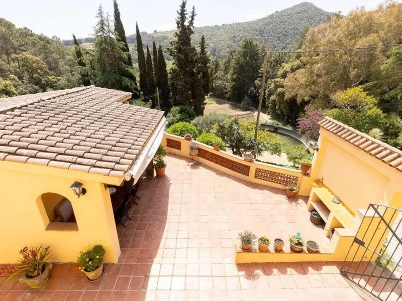 Rehabilitated Catalan Masia with Privacy and Multiple Buildings in the Province of Barcelona