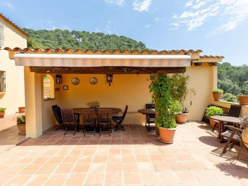 Rehabilitated Catalan Masia with Privacy and Multiple Buildings in the Province of Barcelona