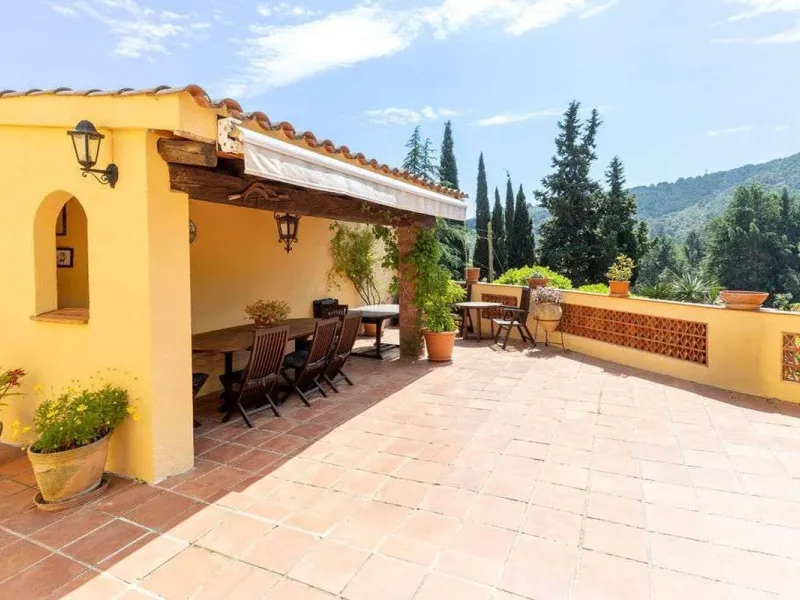 Rehabilitated Catalan Masia with Privacy and Multiple Buildings in the Province of Barcelona