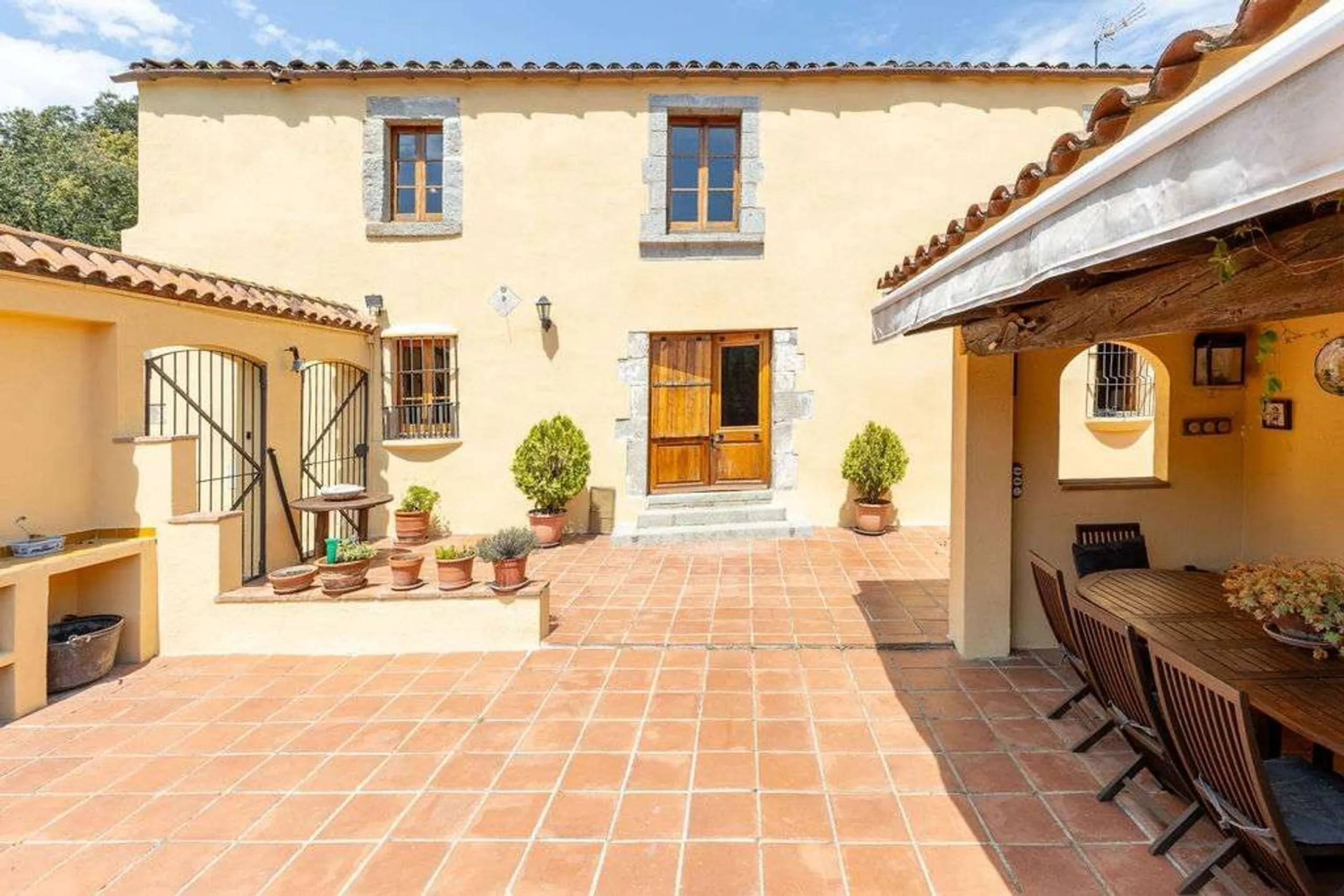 Rehabilitated Catalan Masia with Privacy and Multiple Buildings in the Province of Barcelona