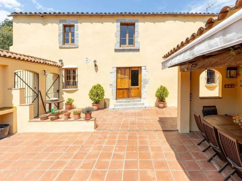 Rehabilitated Catalan Masia with Privacy and Multiple Buildings in the Province of Barcelona