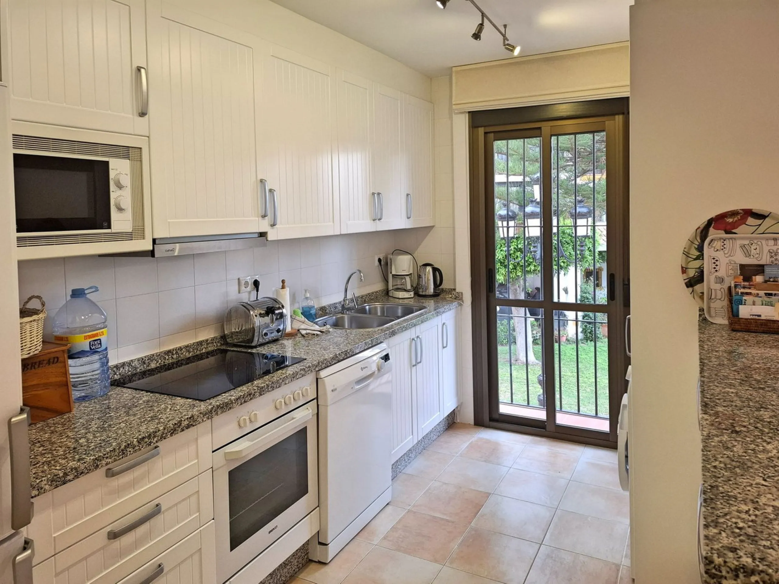Great opportunity within the most famous complex in Fuengirola, Puebla Lucia. This two bedroom, two bathroom apartment is in perfect condition and sold fully furnished. The apartment is spacious and very sunny and has a lovely terrace. The community is ga