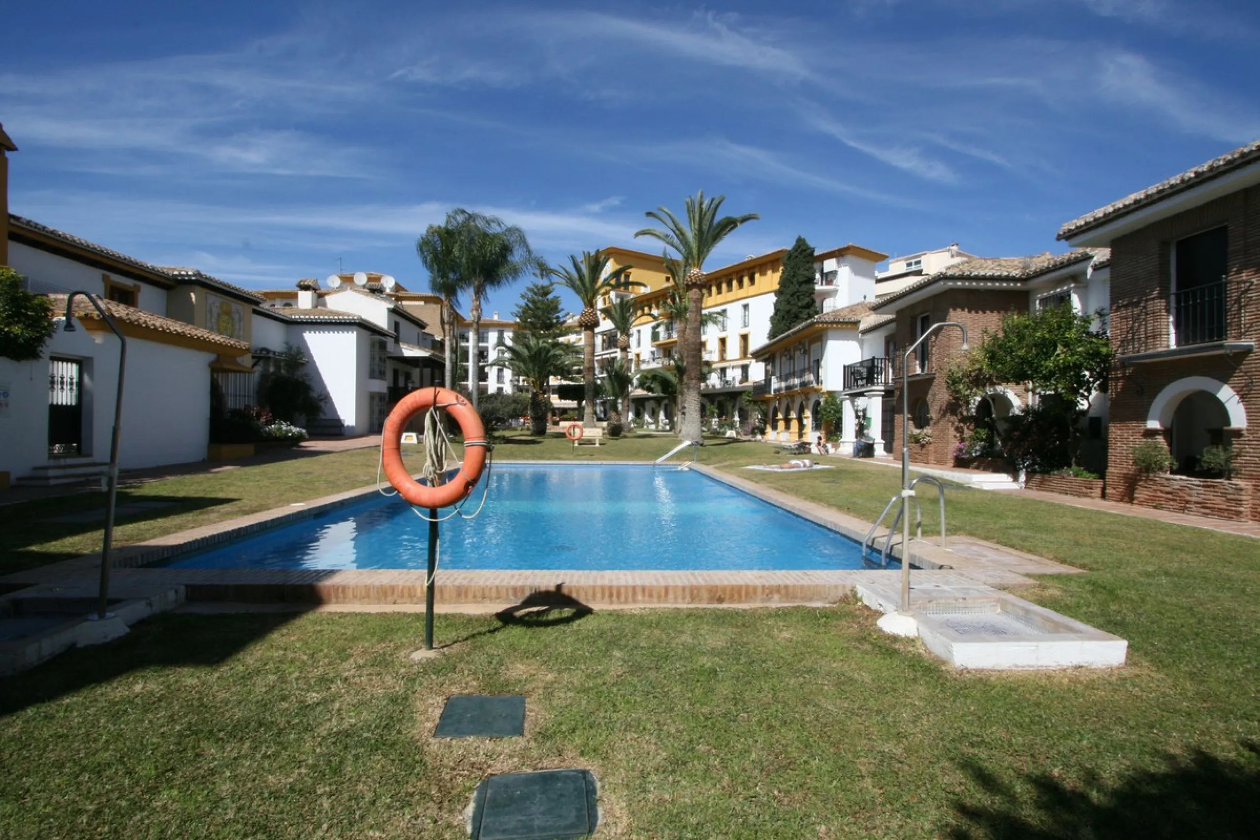 Great opportunity within the most famous complex in Fuengirola, Puebla Lucia. This two bedroom, two bathroom apartment is in perfect condition and sold fully furnished. The apartment is spacious and very sunny and has a lovely terrace. The community is ga