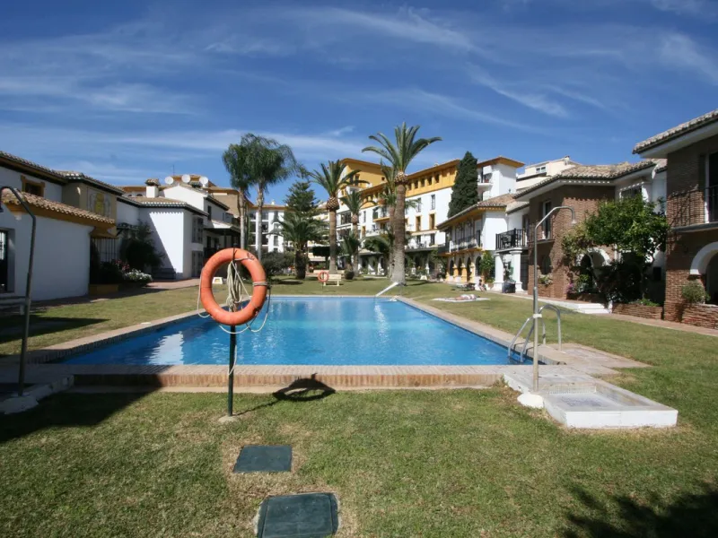 Great opportunity within the most famous complex in Fuengirola, Puebla Lucia. This two bedroom, two bathroom apartment is in perfect condition and sold fully furnished. The apartment is spacious and very sunny and has a lovely terrace. The community is ga