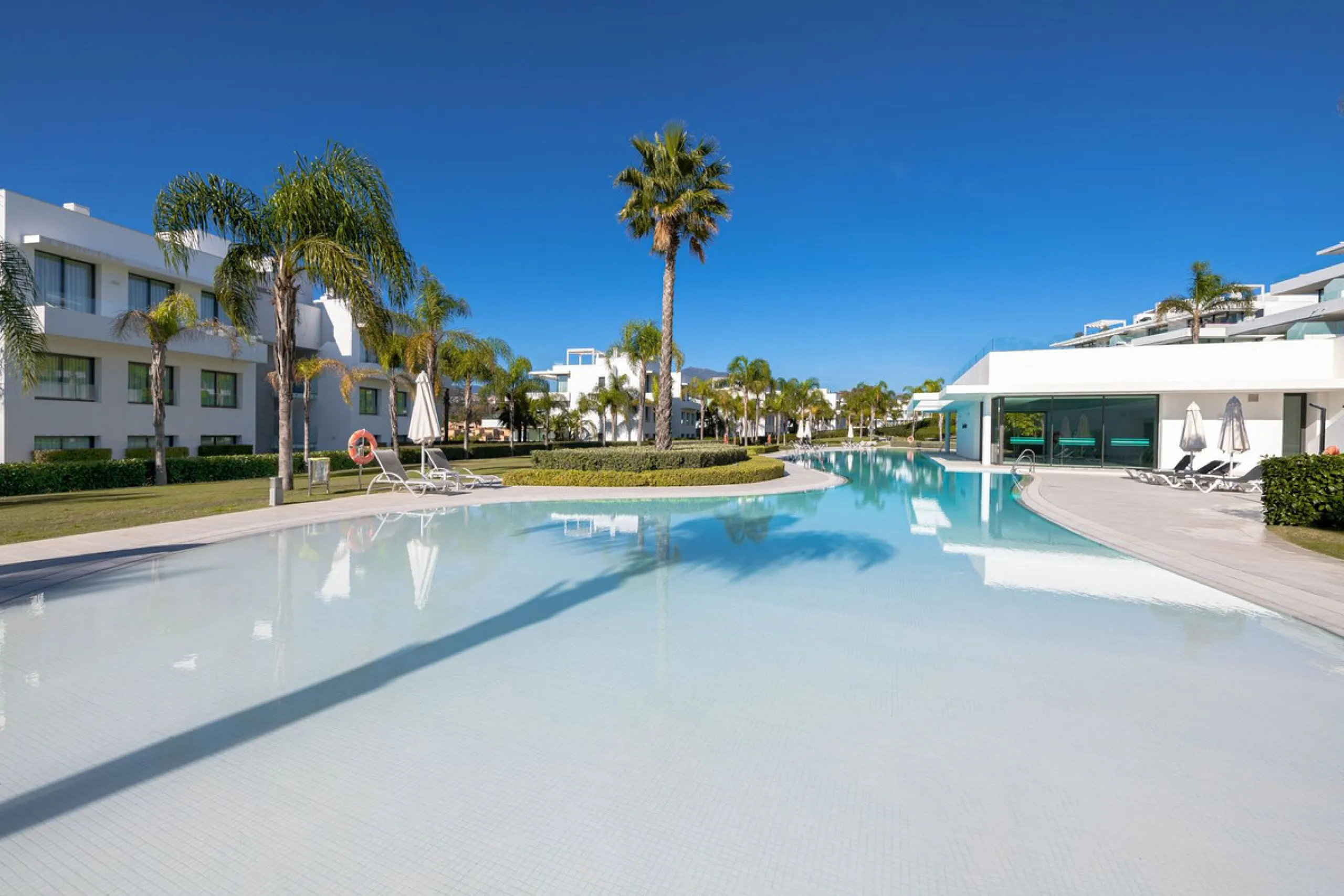 Located in the sought-after Cataleya Phase 2, this rare 2-bedroom first-floor apartment combines modern luxury, expansive outdoor living, and a prime Costa del Sol address. With only three apartments of this layout in the entire development, it offers unm
