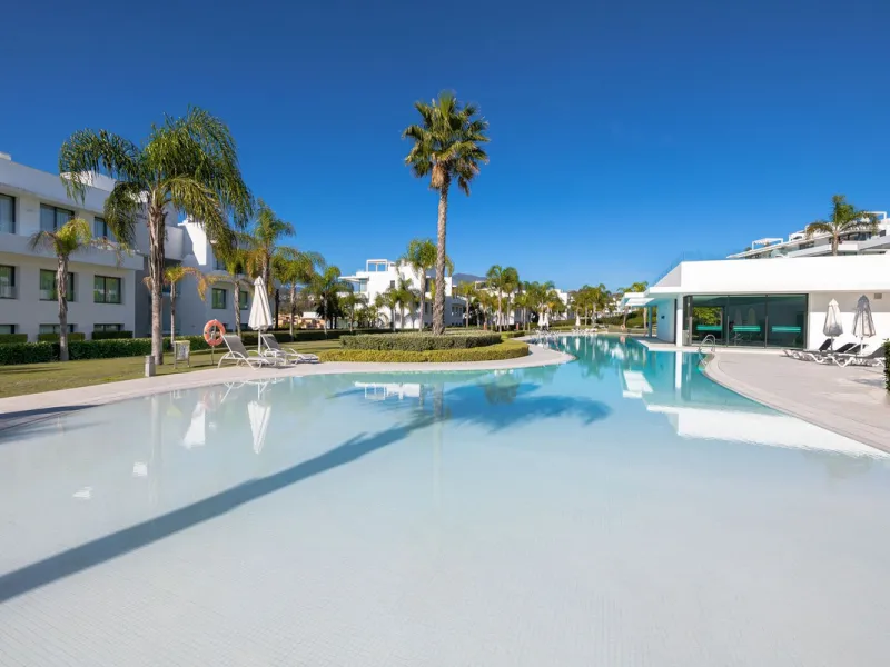 Located in the sought-after Cataleya Phase 2, this rare 2-bedroom first-floor apartment combines modern luxury, expansive outdoor living, and a prime Costa del Sol address. With only three apartments of this layout in the entire development, it offers unm