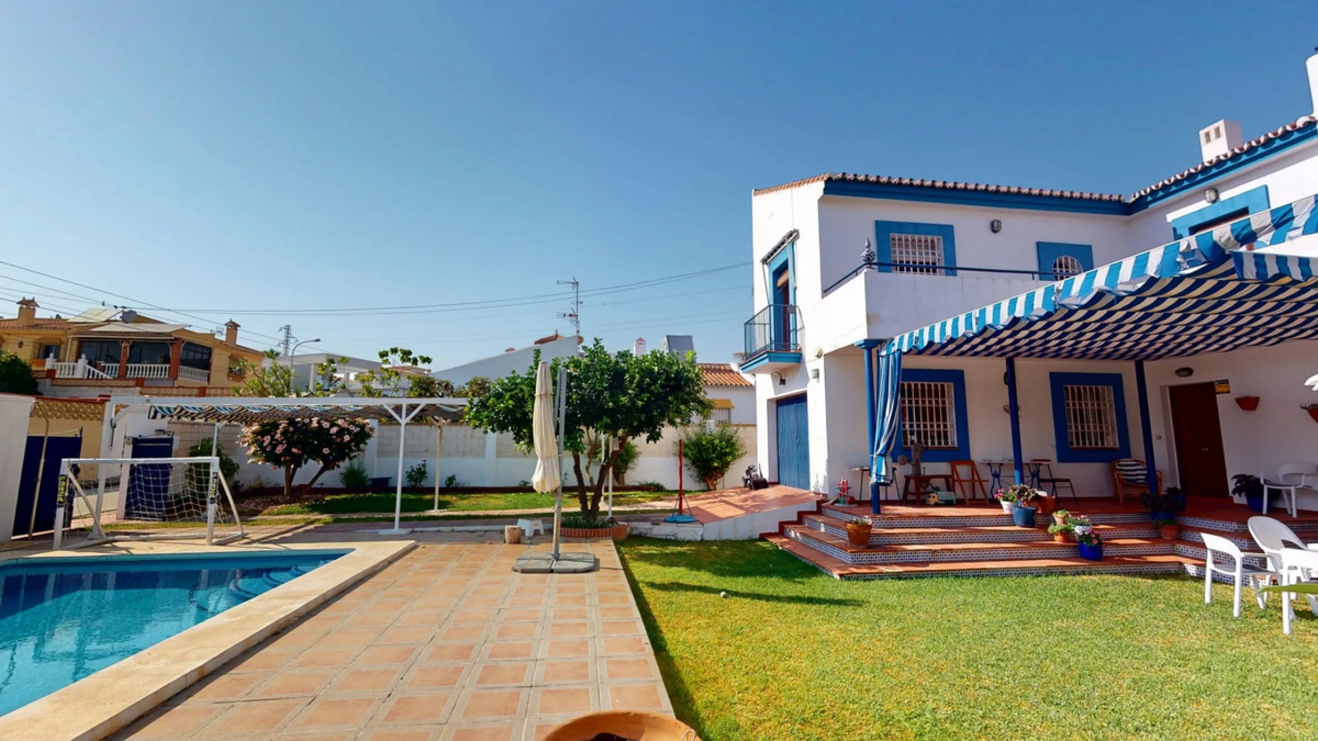 This beautiful Spanish villa spans two floors and features three bedrooms, including an impressive primary suite, and two bathrooms, blending traditional Andalusian charm with modern comfort. The Mediterranean-inspired design is reflected in the terracott