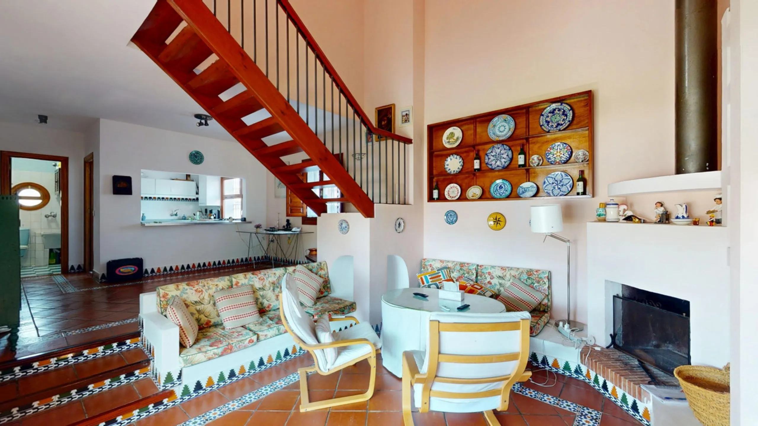 This beautiful Spanish villa spans two floors and features three bedrooms, including an impressive primary suite, and two bathrooms, blending traditional Andalusian charm with modern comfort. The Mediterranean-inspired design is reflected in the terracott