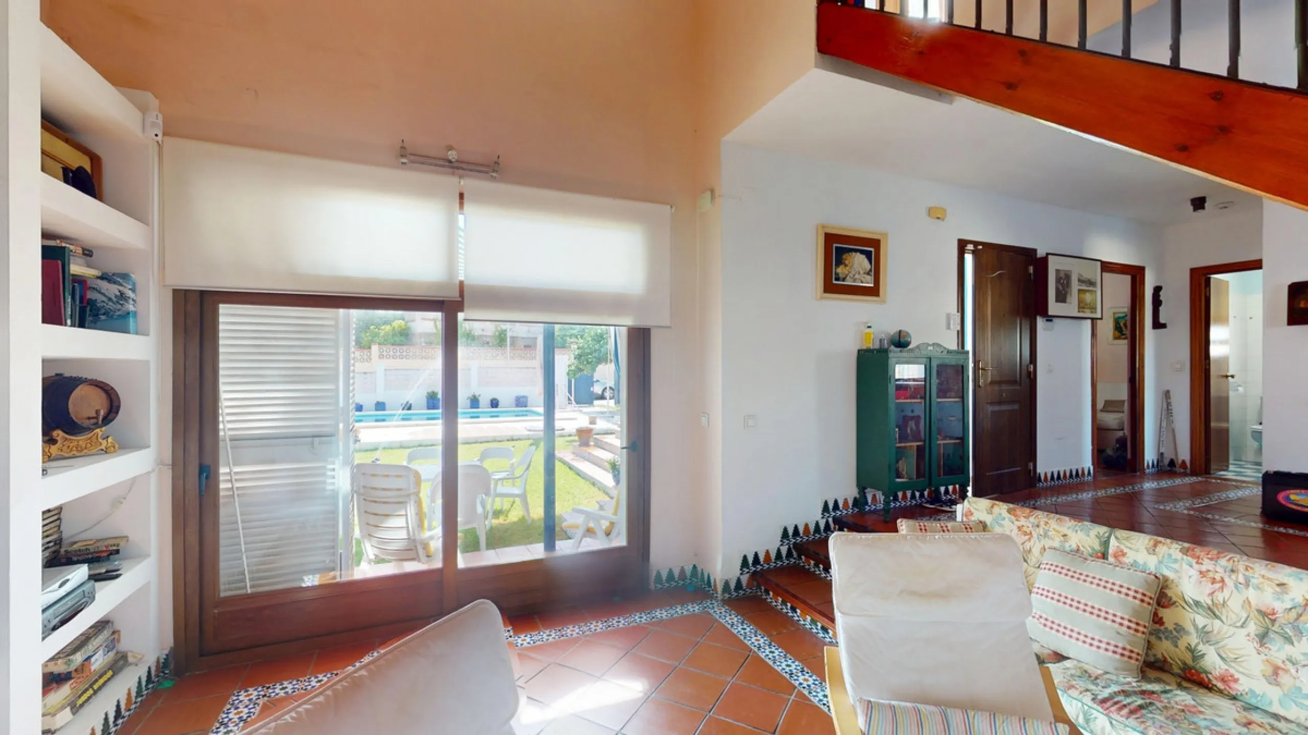 This beautiful Spanish villa spans two floors and features three bedrooms, including an impressive primary suite, and two bathrooms, blending traditional Andalusian charm with modern comfort. The Mediterranean-inspired design is reflected in the terracott