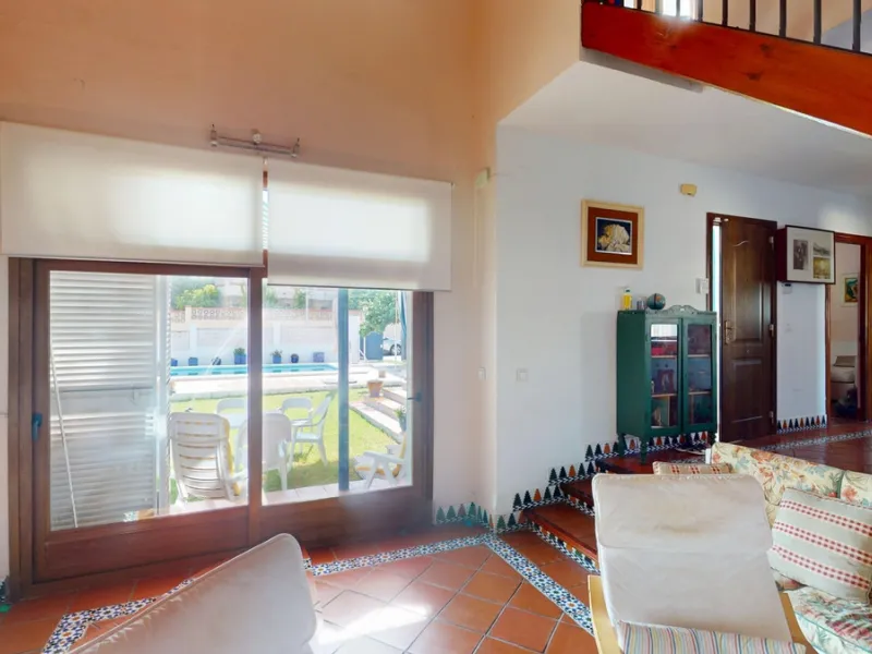 This beautiful Spanish villa spans two floors and features three bedrooms, including an impressive primary suite, and two bathrooms, blending traditional Andalusian charm with modern comfort. The Mediterranean-inspired design is reflected in the terracott