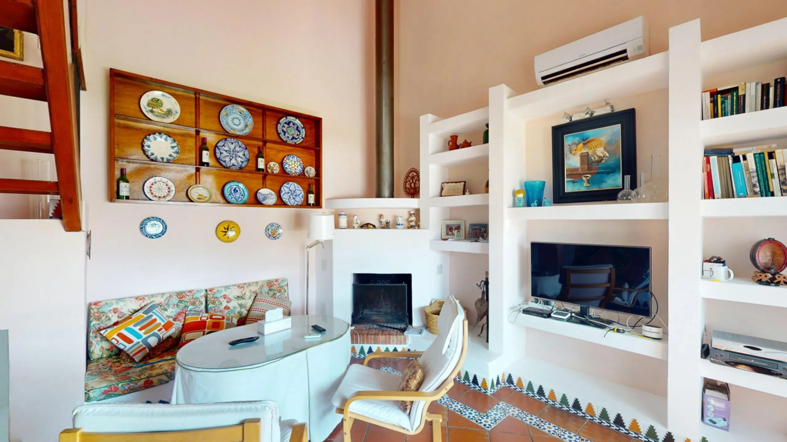 This beautiful Spanish villa spans two floors and features three bedrooms, including an impressive primary suite, and two bathrooms, blending traditional Andalusian charm with modern comfort. The Mediterranean-inspired design is reflected in the terracott