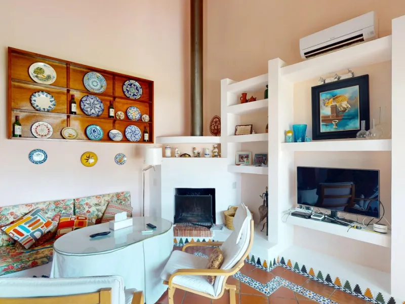 This beautiful Spanish villa spans two floors and features three bedrooms, including an impressive primary suite, and two bathrooms, blending traditional Andalusian charm with modern comfort. The Mediterranean-inspired design is reflected in the terracott