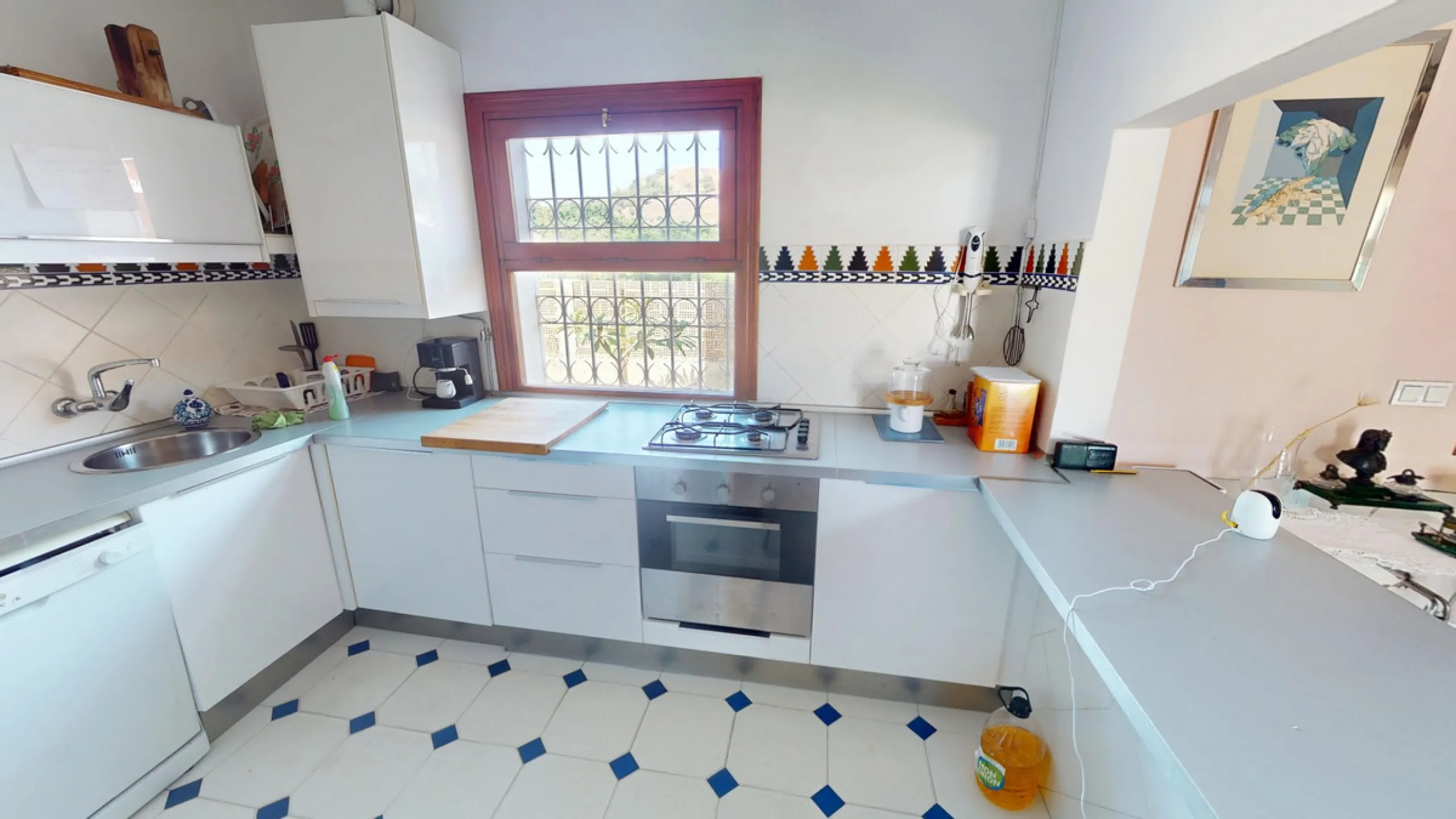 This beautiful Spanish villa spans two floors and features three bedrooms, including an impressive primary suite, and two bathrooms, blending traditional Andalusian charm with modern comfort. The Mediterranean-inspired design is reflected in the terracott