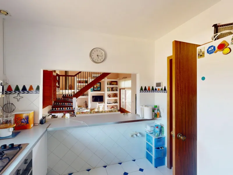 This beautiful Spanish villa spans two floors and features three bedrooms, including an impressive primary suite, and two bathrooms, blending traditional Andalusian charm with modern comfort. The Mediterranean-inspired design is reflected in the terracott