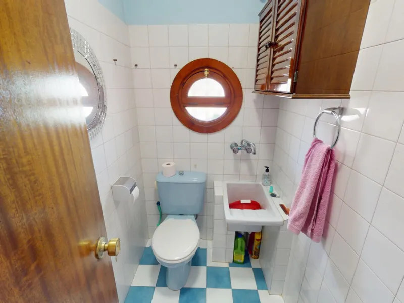 This beautiful Spanish villa spans two floors and features three bedrooms, including an impressive primary suite, and two bathrooms, blending traditional Andalusian charm with modern comfort. The Mediterranean-inspired design is reflected in the terracott