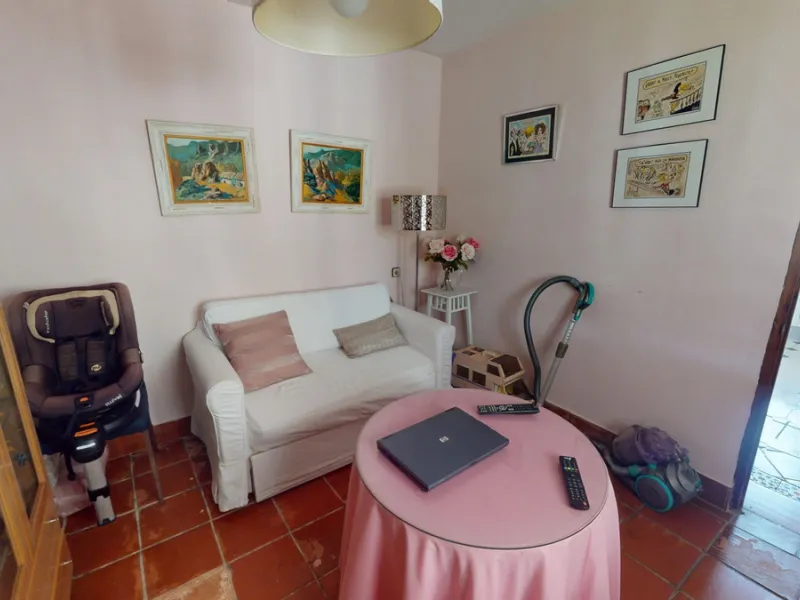 This beautiful Spanish villa spans two floors and features three bedrooms, including an impressive primary suite, and two bathrooms, blending traditional Andalusian charm with modern comfort. The Mediterranean-inspired design is reflected in the terracott