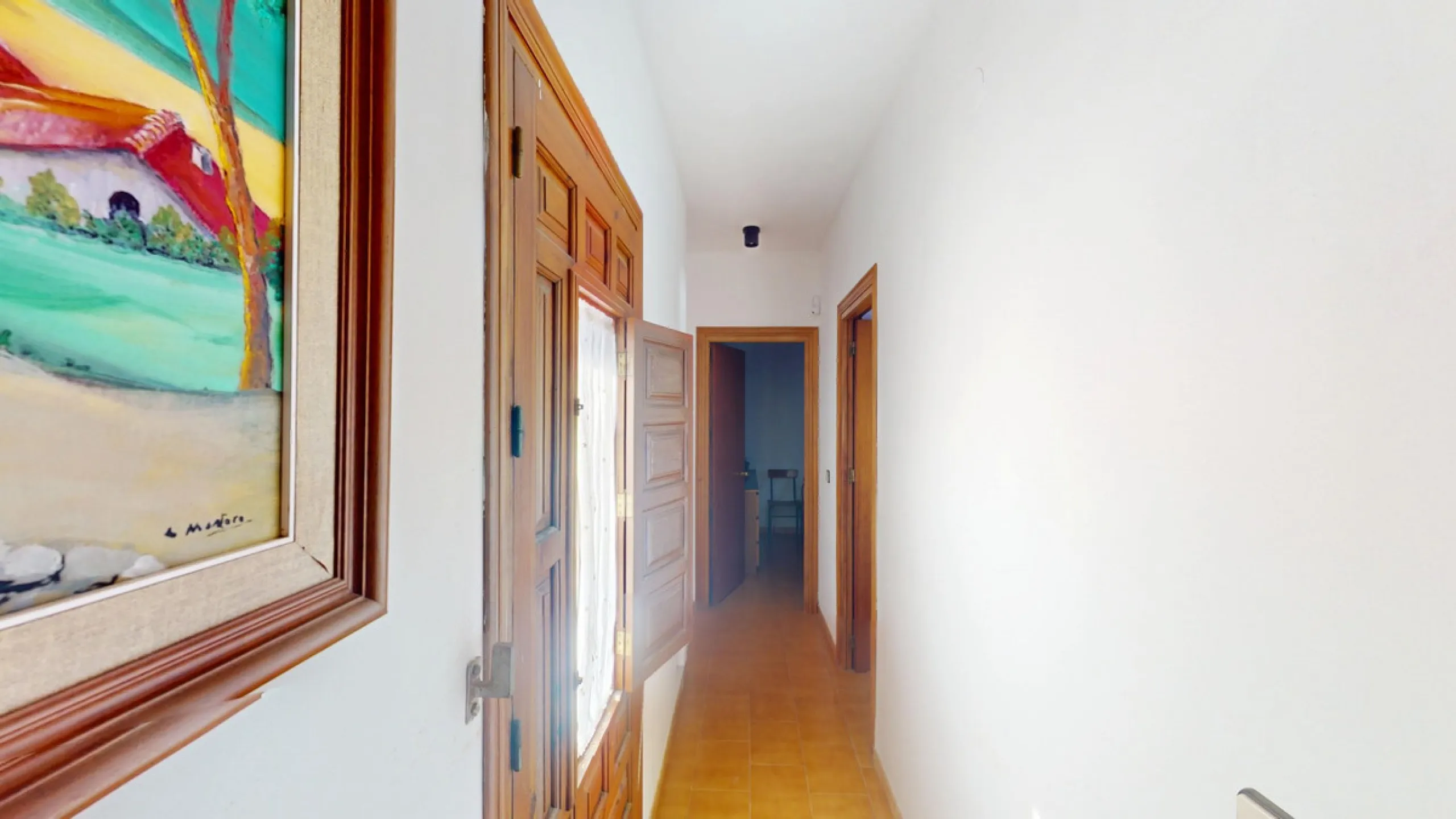 This beautiful Spanish villa spans two floors and features three bedrooms, including an impressive primary suite, and two bathrooms, blending traditional Andalusian charm with modern comfort. The Mediterranean-inspired design is reflected in the terracott