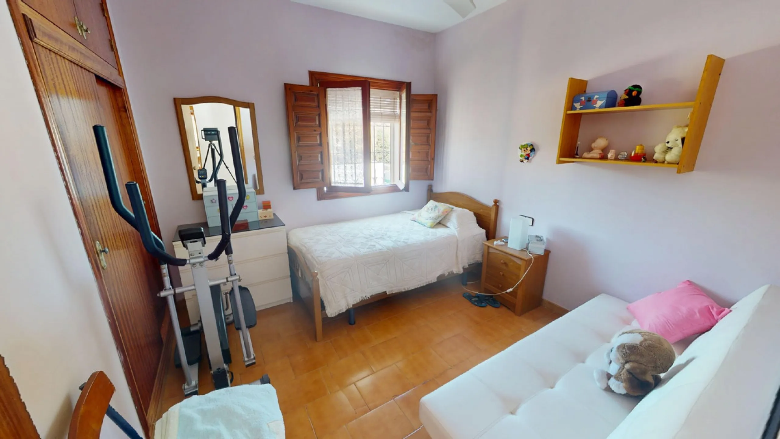 This beautiful Spanish villa spans two floors and features three bedrooms, including an impressive primary suite, and two bathrooms, blending traditional Andalusian charm with modern comfort. The Mediterranean-inspired design is reflected in the terracott