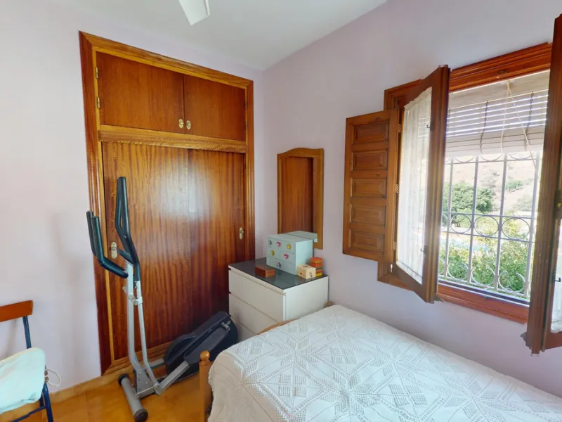 This beautiful Spanish villa spans two floors and features three bedrooms, including an impressive primary suite, and two bathrooms, blending traditional Andalusian charm with modern comfort. The Mediterranean-inspired design is reflected in the terracott