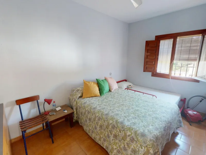 This beautiful Spanish villa spans two floors and features three bedrooms, including an impressive primary suite, and two bathrooms, blending traditional Andalusian charm with modern comfort. The Mediterranean-inspired design is reflected in the terracott